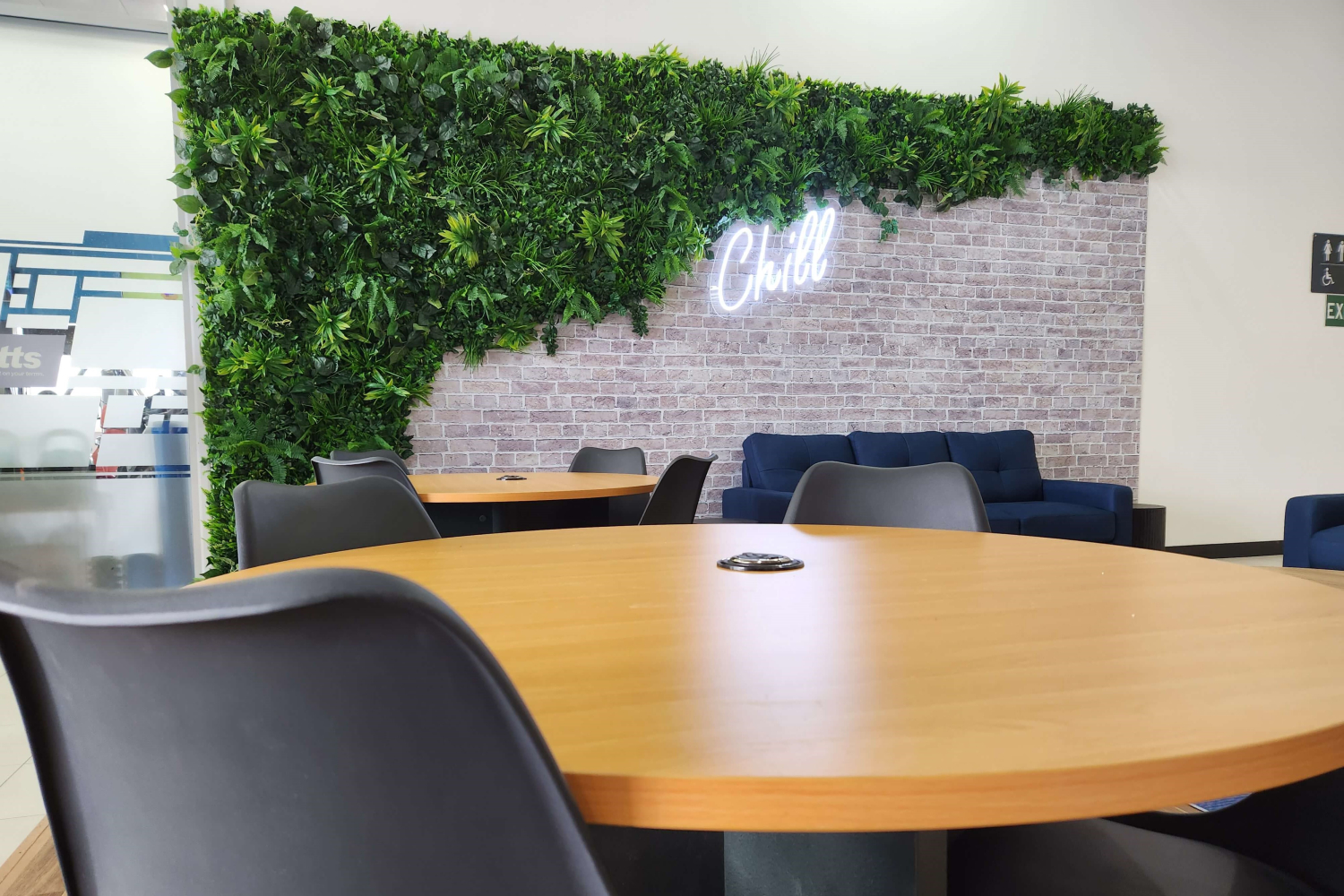 Co-working table with built-in device charging station at chill zone in Southlands Boulevarde Shopping Centre